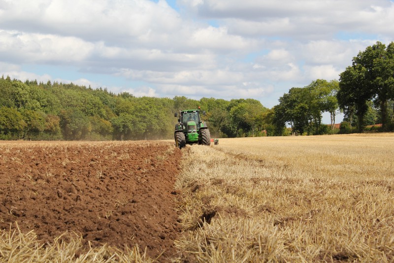 Farmer working with a tractor